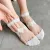 Női vagy nagylány fehér átlátszó rombuszmintás, arannyal átszőtt nylon zokni - ÚJ